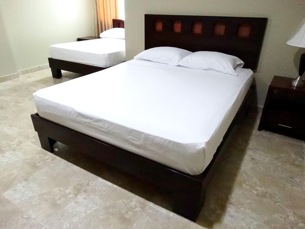 Hotel Marvento Suites Салинас Стая снимка